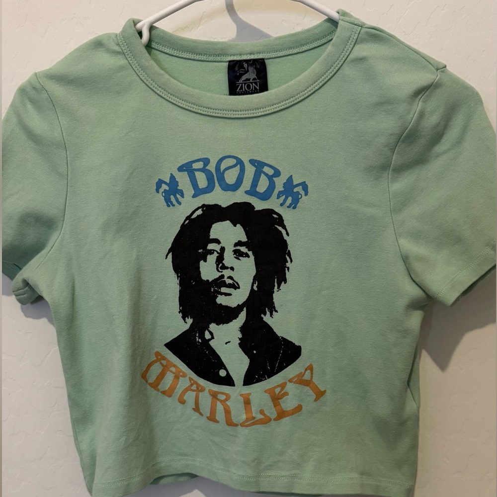 Teal baby tee 
Bob Marley